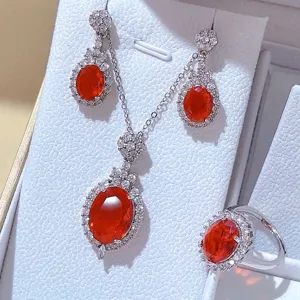 Elegante set di gioielli con pietra rossa collana orecchini e anello zirconi luminosi.