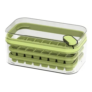 Press-type ice cube mold and storage box set for home kitchen, clear design with green trays.