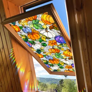 Stained glass window film with festive pumpkin pattern, perfect for seasonal home decoration.