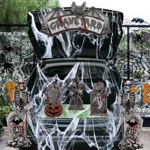 Halloween car trunk decoration set with skeleton tombstones and spider webs for spooky party.