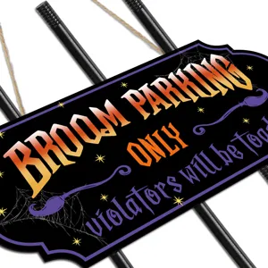 Halloween wooden witch parking sign detail shot, spooky broom yard sign hanging decoration.