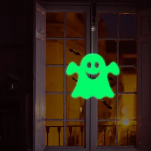 Halloween glowing ghost window hanging detail, luminous decoration showing spooky night effect.