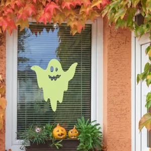 Halloween hanging luminous ghost decoration for window and wall display, festive spooky party prop.