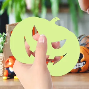 Halloween luminous pumpkin decoration detail shot, showing the glow material and hollow shape.