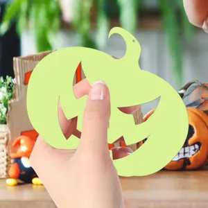 Detail view of Halloween luminous pumpkin wall sticker cutout decor, green glow design for party.