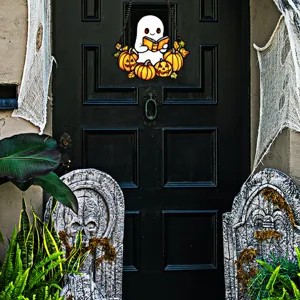 Detailed view of Halloween ghost and pumpkin acrylic hanging decor for festive wall decoration.