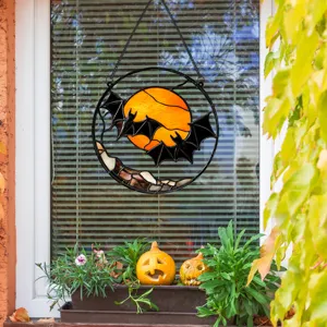 Detailed view of Halloween stained glass bat and moon hanging window decor with iron frame.
