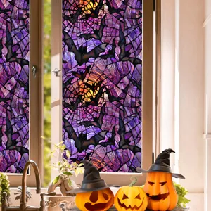 Detailed view of Halloween stained glass window sticker featuring bats and web patterns.