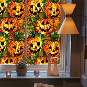 Halloween pumpkin window film detail shot showing vibrant stained glass design on glass.