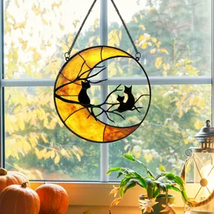 Halloween stained glass round hanging ornament with black cats on moon for home window decor.
