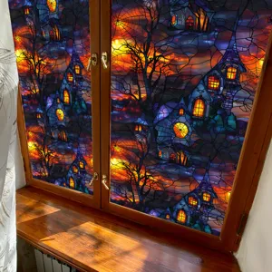 Halloween stained glass window film detail showing spooky castle pattern on wooden window frame.