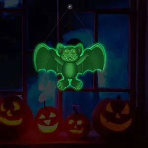 Halloween hanging glowing green bat decoration with suction cup for festive window party props.