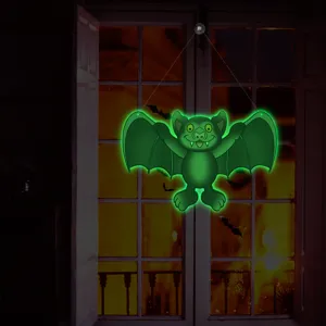 Halloween glowing bat window sticker, green luminous hanging decoration for party decor.