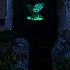 Halloween glowing raven on book acrylic hanging ornament for wall decor, spooky style.