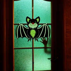 Halloween luminous bat hanging decoration, glowing wall sticker for spooky party home decor.