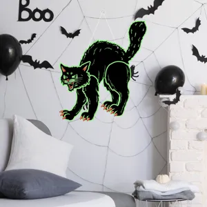 Halloween black cat hanging decoration detail view with glowing green outline and spooky vibe.