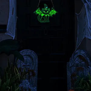 Halloween glowing acrylic cat wall hanging decoration for spooky holiday party setup.