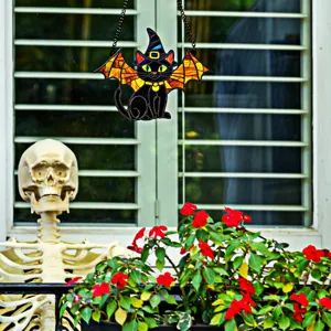 Detailed view of the Halloween black cat acrylic hanging ornament with bat wings and witch hat.