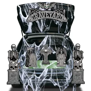 Halloween car trunk decoration set with skeletons, gravestones and cobwebs for holiday party.