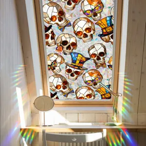 Detailed view of colorful stained glass skull window film creating rainbow light refractions.