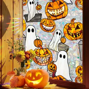 Halloween window sticker detail showing stained glass pumpkin and ghost decal on glass.