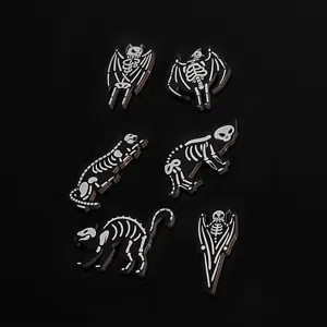 Wooden Halloween skeleton cat and bat decorative fridge magnets detail view, unique spooky style.