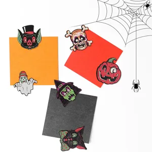 Halloween wooden magnetic fridge sticker detail, cute ghost and pumpkin design for kitchen decor.