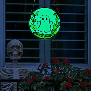 Glow in the dark Halloween ghost acrylic hanging ornament, perfect for wall and window decor.