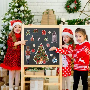 Christmas magnetic sticker set showing festive tree and nutcracker design on blackboard.