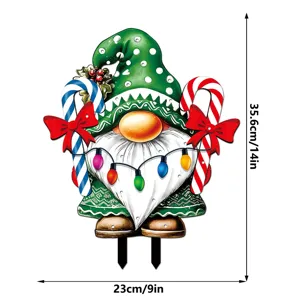 Christmas gnome garden stake with candy canes and lights, holiday outdoor yard decor.