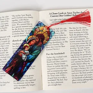 Acrylic clear bookmark with religious stained glass design and elegant red tassel for reading.