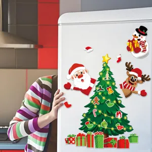 Christmas refrigerator magnet scene display showing festive cartoon tree and Santa stickers.