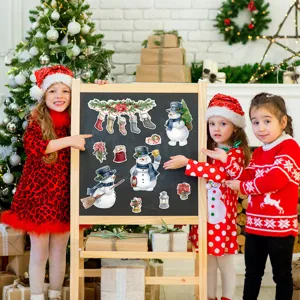 Christmas festive magnetic stickers scene featuring children with holiday snowmen display.
