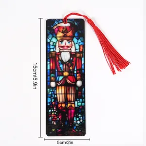Clear acrylic bookmark featuring a classic Christmas Nutcracker design with red tassel.