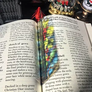Transparent acrylic bookmark with red tassel, 1mm thickness, perfect for reading and book lovers.
