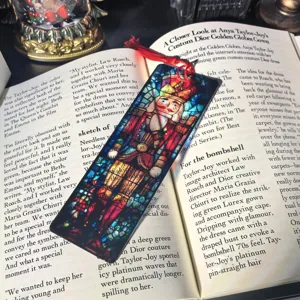 Transparent acrylic stained glass Nutcracker bookmark with red tassel for reading lovers.