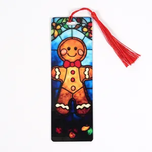 Transparent acrylic Christmas gingerbread man bookmark with red tassel for reading