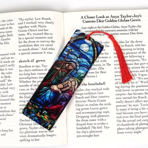 Stained glass style transparent acrylic bookmark with red tassel for reading and stationery.