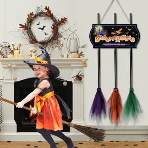 Halloween witch broom parking sign detailed view with colorful decorative hanging props.