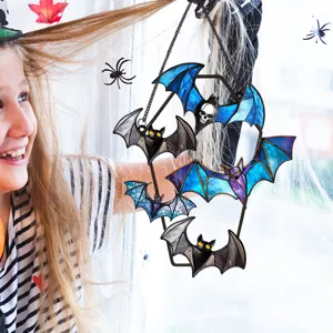 Halloween stained glass style bat metal hanging ornament detail view for wall decor.