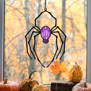 Halloween metal spider hanging ornament with purple crystal body for festive home wall decor detail.
