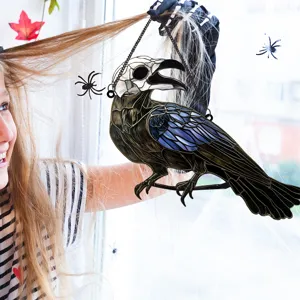 Detailed view of the Halloween raven skull hanging ornament in a festive home setting scene.