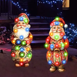 Christmas Santa Claus yard stakes outdoor lighted garden decorations for holiday decor.