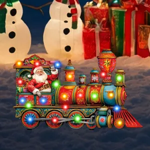 Christmas lighted train yard stake decoration, glowing holiday garden ornament with cute Santa.