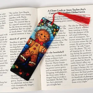 Christmas transparent acrylic bookmark detail with red tassel, cute gingerbread man stationery craft.
