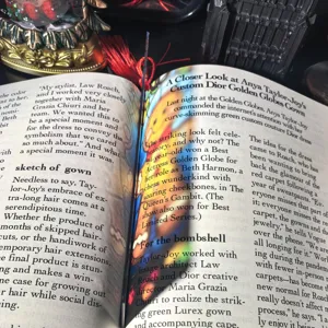 Transparent acrylic bookmark with red tassel, clear book page marker for stationery lovers.