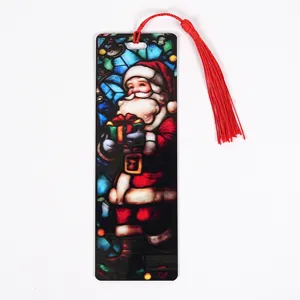 Transparent acrylic Christmas bookmark with stained glass Santa Claus and red tassel.