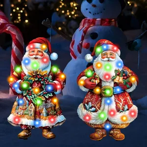 Christmas LED yard signs, waterproof glowing Santa Claus stakes for outdoor holiday garden decor.
