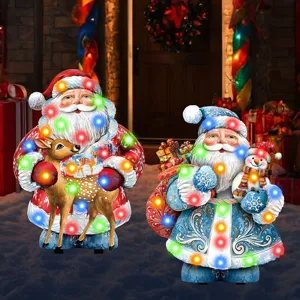 Illuminated Christmas yard stakes featuring Santa Claus figures with LED lights for outdoor decor.