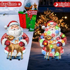 Christmas garden stake detail showing glowing Santa and deer in day and night contrast view.